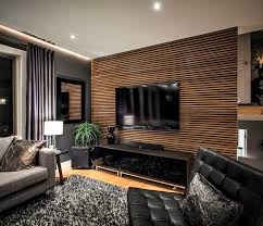 When using stone for walls outdoors, choosing a dark colour that resembles brick brings a cohesiveness to the functionality and the beauty of the area, as this beautiful terrace design shows us. Modern Tv Unit Design D Interio