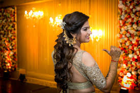 Indian Hairstyles For Weddings With Bahubali Jhumkas Mehendi Hairstyles Indian Hairstyles Indian Wedding Hairstyles Indian Bridal Hairstyles