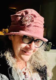 Whimsical top hat I made. The scarf can be changed to change the look.