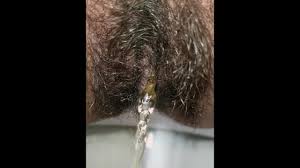Indian cool girl pissing with beautiful view in village toilet - almost  caught