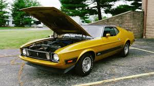Image result for Bright Yellow 1973 Colt