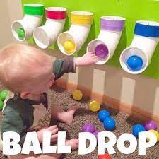 Ball Drop I Saw This On Pinterest And When We Put Together A Playroom For Boy For Christmas My Husban Toddler Activities Infant Activities Kids And Parenting