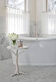 Small Splendor 30 Bathrooms That Charm With A Side Table For The Bathtub Beautiful Bathrooms Interior Free Standing Bath Tub