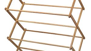 As an architect, the thing i love about it most is that the drying rods also serve as the structural support of the rack. Bamboo Wooden Clothes Drying Rack Storables