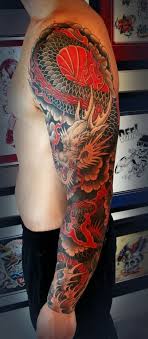 Black And Red Dragon Tattoo Designs Japanese Red Dragon Tattoo On Whole Arm Dragon Sleeve Tattoos Japanese Dragon Tattoos Tattoo Sleeve Men