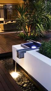 Gartenbrunnen Und Wasserfalle Tipps Fur Die Installation Selberbauen Wasserspiele Bachlauf Garten Garden Lighting Design Modern Water Feature Modern Pond