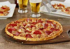 Tastes like uno used to taste but without tomato chunks. Chicago 31st St Pizza Restaurant Home Run Inn