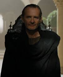 Qyburn is a former maester, having been stripped of his chains long before the start of the story, reduced to being a traveling healer. Qyburn Anton Lesser Game Of Thrones Queen Celebrity Crush