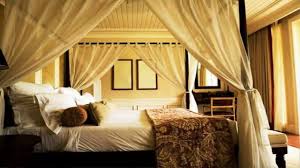 The flowing canopy over the bed gives the room a fresh and lively feel. Canopy Bed Decorating Ideas That Wow Youtube