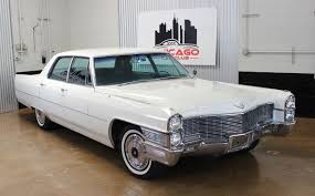 Image result for Starlight Silver 1965 Cadillac
