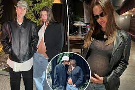 Justin Bieber shows off pregnant Hailey's growing baby bump in new photos: 'They wish'
