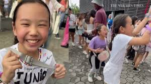 Primary 5 pupil Giselle Heng scores Taylor Swift's '22 hat' at first night  of Eras Tour gig in S'pore