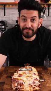 A Reuben Sandwich Loaf made for a party! #sandwich #reubensandwich  #pastrami #partyfood #deliciousfood #easyrecipe