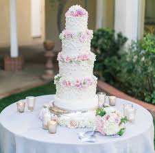 The choice of flowers and the way you position them on your cake will give it a very different pick organic fresh flowers in vibrant reads, yellows and blues for a fun and relaxed look. 20 Ways To Decorate Your Wedding Cake With Fresh Flowers