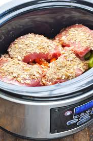 Pour gravy over pork chops, then sprinkle dry ranch dressing mix over gravy. Slow Cooker Pork Chops With Vegetables And Gravy The Seasoned Mom