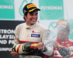 Sergio perez sahara force india f1 celebrates his third position on the podium at european gp. 2012 Malaysian Gp Podium Sergio Perez Wallpaper 30467198 Fanpop