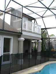 This back porch oasis allows you to recline, enjoying the morning paper and rising sun, or soaking in the ocean breezes and cool coastal nights. Screen Enclosures Raszl Inc Palm Coast Pool And Spa Builders