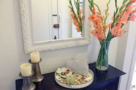 Mirror Flowers Ans A Bowl For Keys Entry Way Check Apartment Entryway College Apartment Decor Apartment Decor