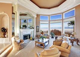 White living room beautifully contrasted with black leather sectional and armchair that sits beside the fireplace topped with lovely vases and wood framed mirror. 45 Beautiful Living Room Decorating Ideas Pictures Designing Idea