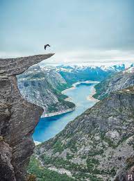 Kjeragbolten hanging rock norway stock photo edit now 1508029691. Magnus Midtbo Hanging From Trolltunga Norway 700m 2 300ft Above Sea Climbing