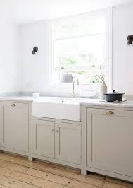 Clay Colors Are Trending For Kitchens Purewow Taupe Kitchen Cabinets Farmhouse Style Kitchen Cabinets Taupe Kitchen