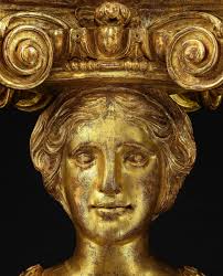 A pair of George II giltwood terms designed by William Kent and attributed  to Benjamin Goodison