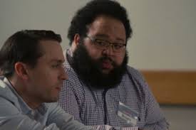 Zach Cherry, the actor who plays Brian, Roman's fan-favorite training pale,  is currently playing Dylan, a serie regular and the same kind of peculiar  employee with a big ego, in the new