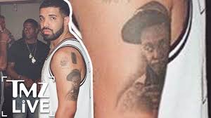 We get to know each of his tattoos and the stories behind them. Drake Gets Lil Wayne Tattoo Tmz Live Youtube