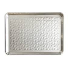 This is a 10.5 x 12.5 disposable aluminum pan. Naturals Embossed Heart Half Sheet Pan Nordic Ware