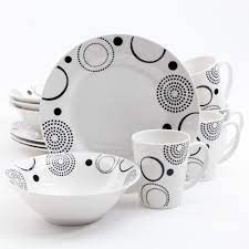 There is both white and colored dinnerware provided to meet diverse decorative demand. Gibson Home 12 Piece Mid Century Decorated With Black Geometric Design On White Porcelain Dinnerware Set Service For 4 102227 12rm The Home Depot