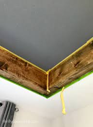 I used my multitool to cut out 7″ wide pieces of crown. Cozy Tray Ceiling Makeover In The Master Thrifty Decor Chick Thrifty Diy Decor And Organizing