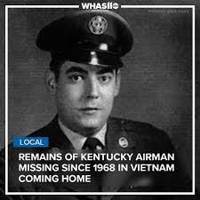 Description: Bill Culbertson putting up Christmas decorations