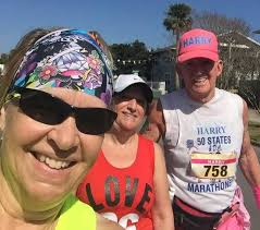 What former club member has completed 327 marathons?