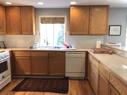 Not a traditional honey oak kitchen but this has a nice creamy countertop. Backsplash Tiles With Honey Oak Cabinets Novocom Top