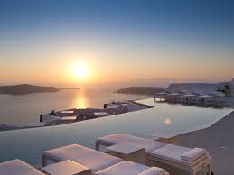 17 Stunning Infinity Pools Around The World Grace Hotel Santorini Hotel Pool Hotels With Infinity Pools