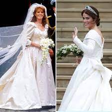 An estimated crowd of 100,000 gathered to see the couple's first public kiss as man and wife on the balcony of buckingham palace. How Does Princess Eugenie S Wedding Dress Compare To Mom Sarah Ferguson S Gown Eugenie Wedding Royal Wedding Gowns Wedding Dresses