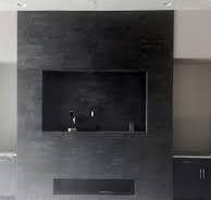 Ebony Basalt Lynia Interlocking | Black Tile Fireplace Wall