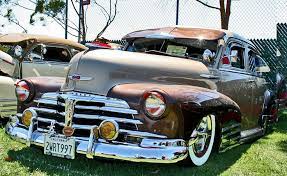 Two Tone 48 Four Door Sedan Notice The Open Wind Wing At The Rear Of The Drivers Side I Believe That Was Only Used Lowrider Trucks Lowrider Cars Classic Cars