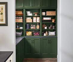 To balance out extra tall storage, the peninsula features horizontal wood banding. Diamond At Lowes Finishes Thicket On Rustic Alder