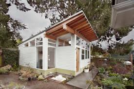 Tiny Backyard Oasis Built By First Lamp Is Filled With Midcentury Finds Tiny Houses Smart house condos test the limits : tiny backyard oasis built by first lamp