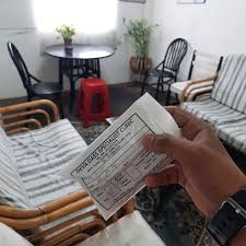 Professional doctor man wears protective mask on face, white coat invites patient client to sit on chair in medical office. Belikan Ubat Untuk Client Kl Runner Delivery Facebook