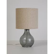 Like small jewels in shiny brass and grey clear glass, the lamps in the solklint series spread a soft mood light that creates exciting shadows on walls and ceilings the lamp gives a soft light and creates a warm, cosy atmosphere in your room.light bulb sold separately. Grey Glass Table Lamp Home George At Asda