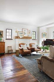 Living Room Painted Fireplace Reclaimed Wood Mantel Leather Chairs Art Antique Art Floor Living Room Wood Floor Sconces Living Room English Living Rooms