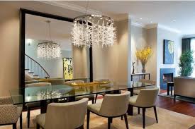 With its chrome legs and glass table top, this table has a modern look and feel, while still being able to fit with any color decor. Glass Top Tables Magnifying Beautiful Dining Room Design