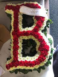 Red tulips are typically used to convey perfect love, while white tulips symbolize forgiveness or worthiness. Red Sox B Funeral In East Providence Ri P J Florist