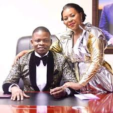 Pastor shepherd bushiri stands on with his wife, mary bushiri, during the united prayers crossover at the fnb stadium in soweto, south africa [file: Things You Did Not Know Prophet Bushiri Has 3 Passports In Different Location See More Updates Style You 7