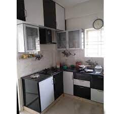 Explore your options for black kitchen cabinets, and browse helpful and inspiring pictures for ideas from hgtv. Black And White Aluminium Modular Kitchen Rs 900 Square Feet Woodmark Interiors Id 20232846112