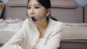 BoundHub - open mouth bondage