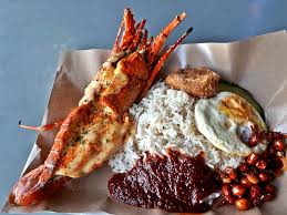 Crispy fried chicken wings, salty ikan bilis, runny eggs, spicy sambal chilli, and fluffy white coconut rice. Penang Lobster Cheese Nasi Lemak At Projek Nasi Lemak Box Asia Pacific Hungry Onion