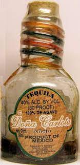 New listingdon julio tequila bottle set (empty) wooden cork top reposado dark glass. Miniature Bottle Library Dona Carlota